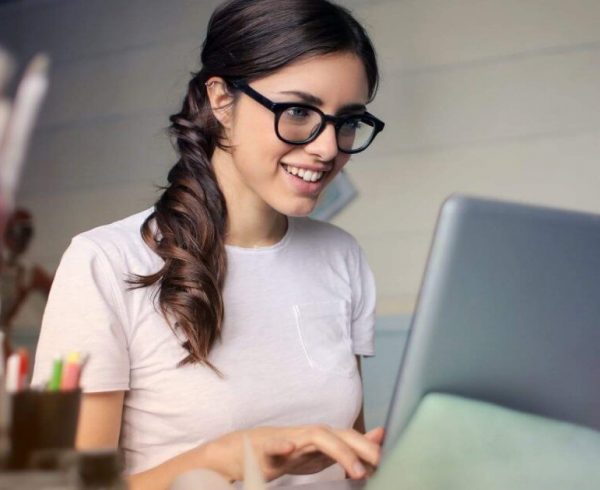 woman searching in laptop